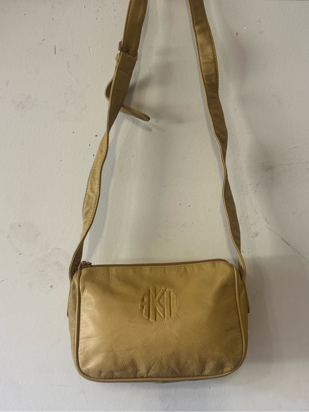 Yellow Leather Crossbody Bag with Embossed Monogram